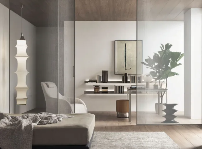 Living room with a glass partition and matched timber finishes